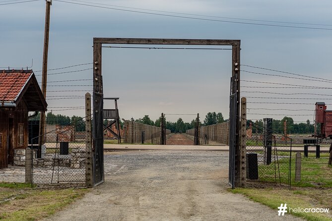 Auschwitz & Birkenau Guided Tour with Hotel Pickup from Krakow - Auschwitz I and the gate marked Arbeit Macht Frei
