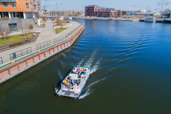 Cruises on the Motlawa River by a luxury catamaran - Gdańsk from the water side - A small catamaran rather than a big harbor boat
