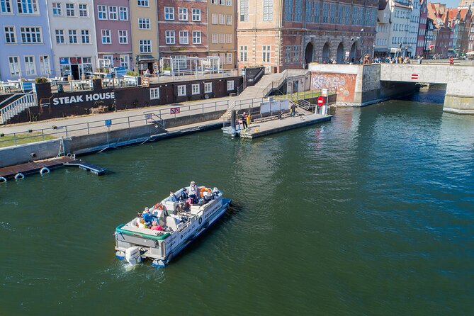 Cruises on the Motlawa River by a luxury catamaran - Gdańsk from the water side - From Dlugie Pobrzeze to the old river gates