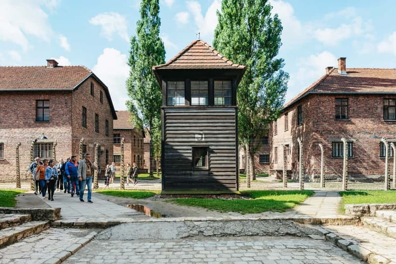 From Krakow: Auschwitz-Birkenau Guided Tour & Hotel Pickup - Auschwitz I: the gate and original barracks