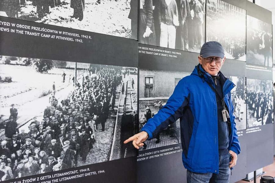 From Krakow: Auschwitz & Birkenau Guided Tour with Pick up - Wooden barracks and the ruined crematoria
