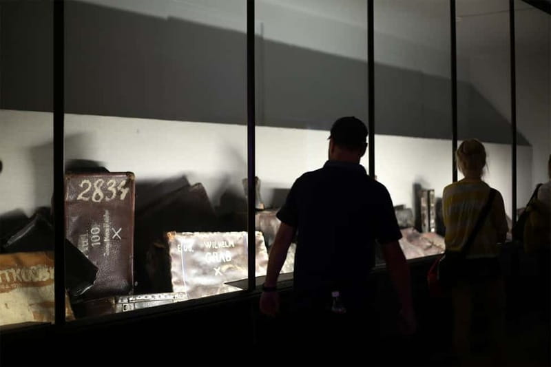 From Krakow: Auschwitz Museum and Wieliczka Salt Mine Tour - Entering Auschwitz I and the museum grounds