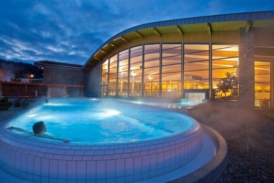 From Kraków; to Białka Thermal Baths private tour - Five activity pools, slides, and family energy