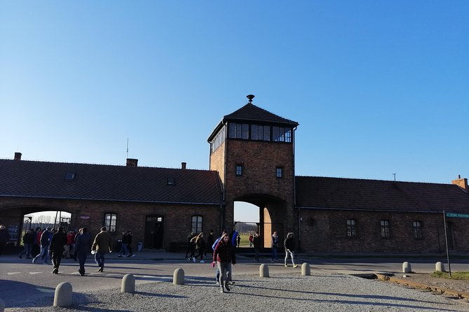 From Warsaw Auschwitz and Krakow one day tour by train with pick up and drop off - Three hours in Krakow’s Old Town