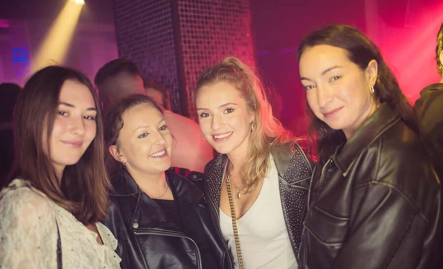 Fun explorers pub Crawl with 1 hour open bar and 3 VIP clubs - Walking through Krakow’s Old Town at night