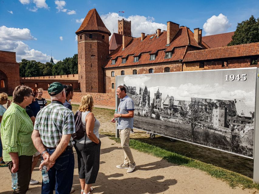 Gdansk: Malbork Castle & Westerplatte Tour with Local Lunch - From fortress walls to Żuławy’s wooden houses