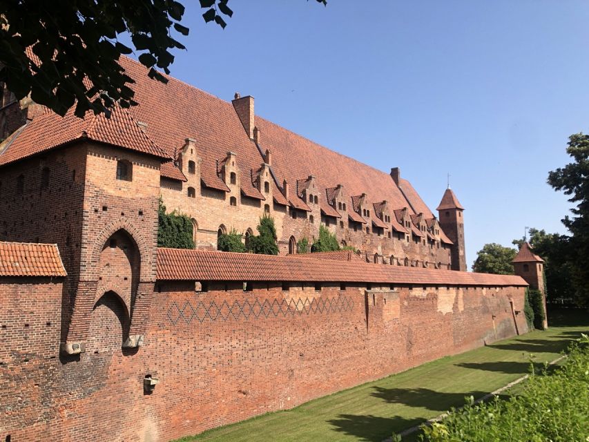 Gdansk: Malbork Castle & Westerplatte Tour with Local Lunch - A Polish lunch in a traditional wooden house