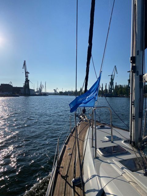 Gdańsk: Motlawa and Port yacht cruise with Welcome Drink - Boarding beside Oria Magic House