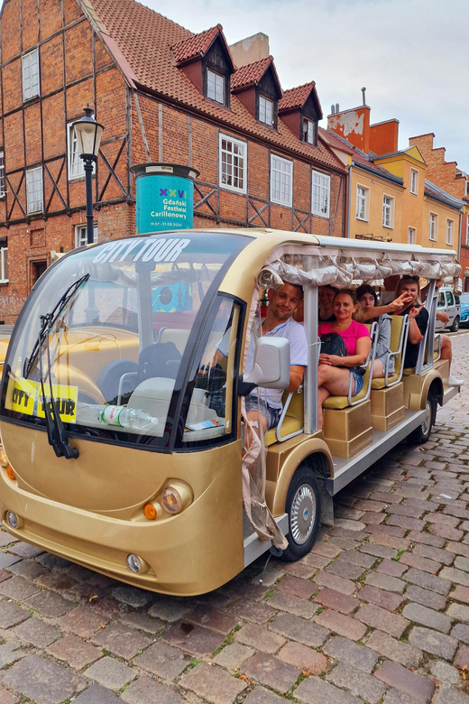 Gdansk: Shared or Private City Tour Sightseeing By Golf Cart - What the guide adds to the ride