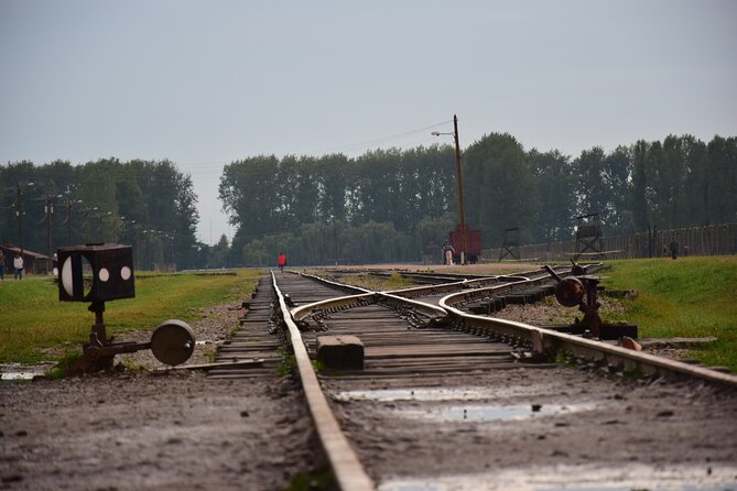 Guided Tour Krakow to Auschwitz-Birkenau with pickup options - Entering Auschwitz I and the original barracks