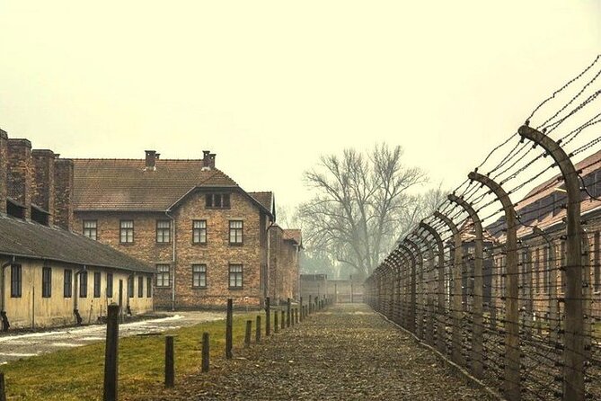 Krakow: Auschwitz-Birkenau Guided Tour & Hotel Pick Up - Auschwitz I: exhibits, barracks, and Arbeit Macht Frei