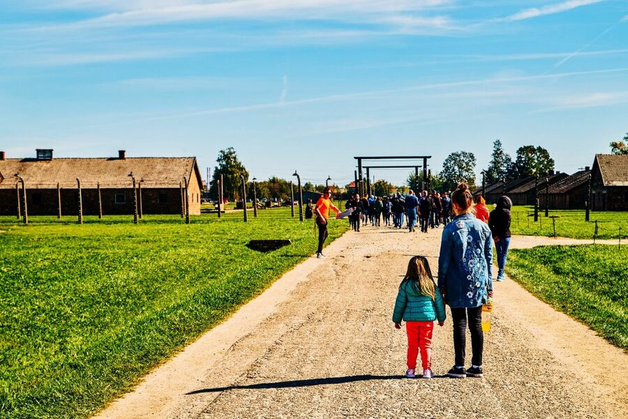 Krakow: Auschwitz-Birkenau Live Guided Tour & Hotel Pickup - How the guide and host shape the experience