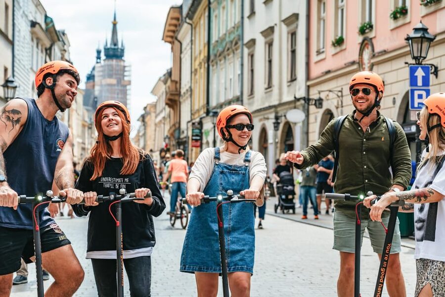 Krakow: Guided E-Scooter City Tour with Food Tastings - St. Mary’s Basilica, Florian’s Gate, and Jagiellonian University