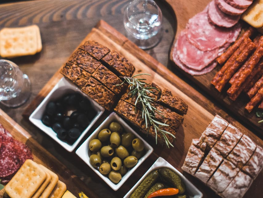 Kraków: Guided Vodka Tour with Food and Drink Tastings - Communist-era atmosphere and old drinking customs