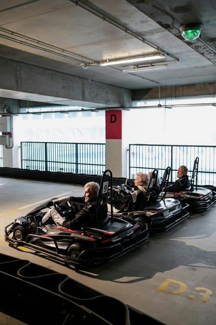Krakow: Indoor Go-Karting (24-Minute Races) - Safety gear and staff support