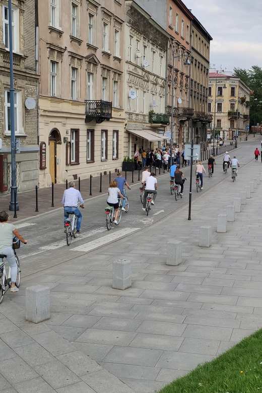 Krakow: Multilingual Tour On Electric Bikes - Riding through Krakow’s Old Town