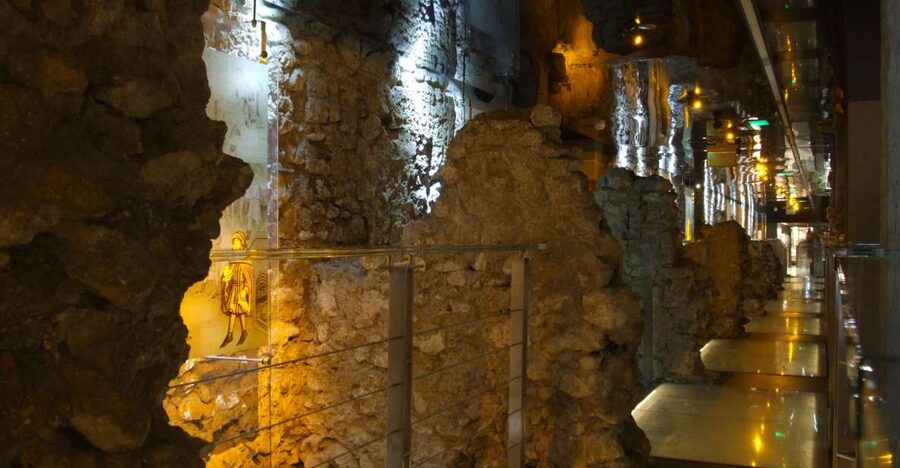 Krakow: Skip the Line Underground Museum and Old Town - Skip-the-line entry, with a clock attached