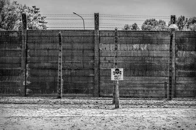 Krakow to Auschwitz-Birkenau Live Guided Tour & Hotel Pick-up - Auschwitz I and the gate beneath Arbeit Macht Frei