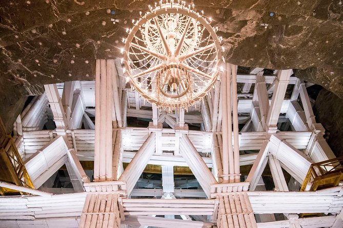 Krakow to Wieliczka: Salt Mine Guided Tour with Ticket & Transfer - The 64-meter stairway into Wieliczka