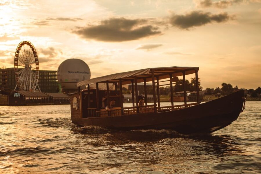 Krakow: Vistula Night Cruise by Gondola w/ Audio Commentary - A calm view of Krakow after dark