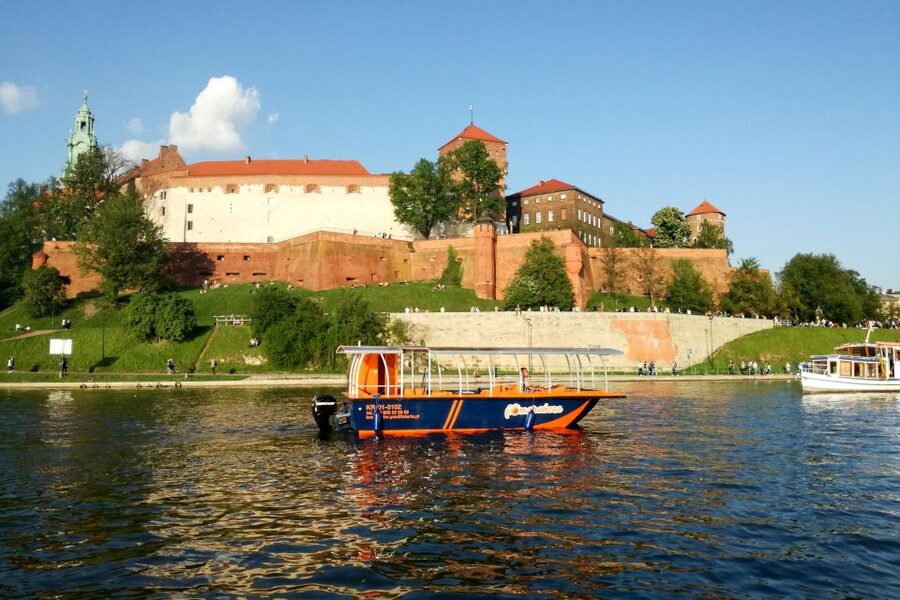 Krakow: Vistula River Cruise with Historical Views - The boat, seating, and weather
