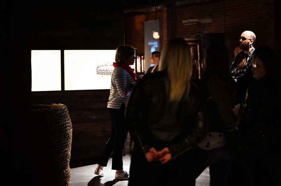 Krakow: Vodka Factory Museum Ticket & Audioguide and Tasting - A wall of Polish vodka memories