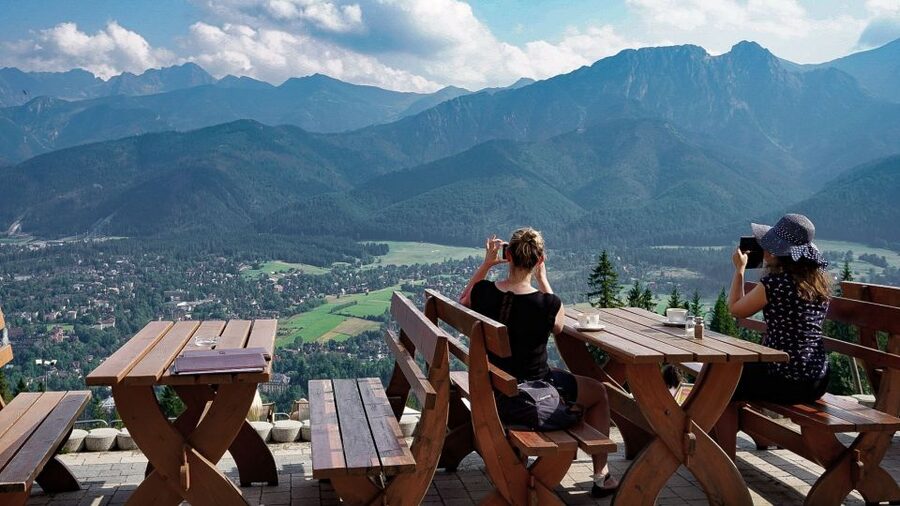 Krakow: Zakopane Cable Car, Spirits, Tasting & Thermal Baths - Krupówki Street is lively, commercial, and convenient