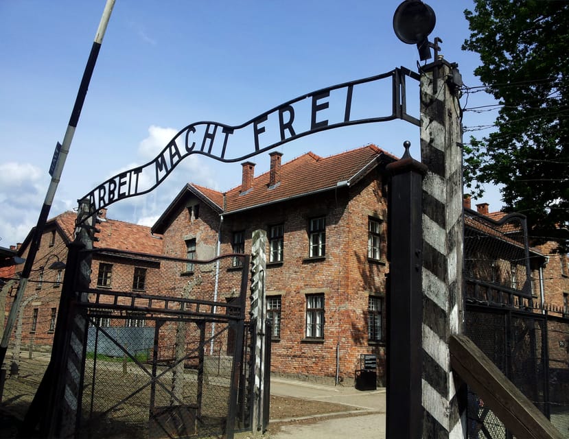 Oswiecim: Auschwitz-Birkenau Skip-the-Line Entry Tickets - Entering Auschwitz I through the famous gate