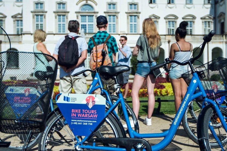 Secrets of Warsaw 4-hour Bike Tour - Modern towers beside communist-era Warsaw