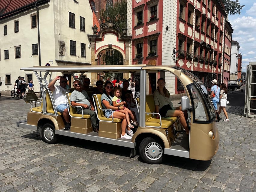 Wroclaw: City Tour Sightseeing By Golf Cart Shared Or Privat - Grunwaldzki Square, bridges, and the eastern city
