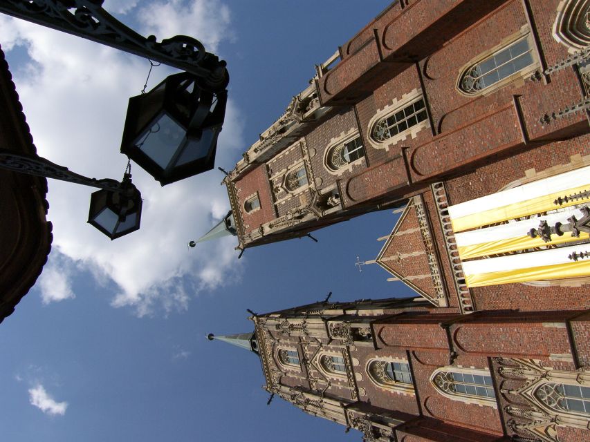 Wroclaw: City Walk and Cruise by Luxury Solar Catamaran - A city tour that switches from cobblestones to water